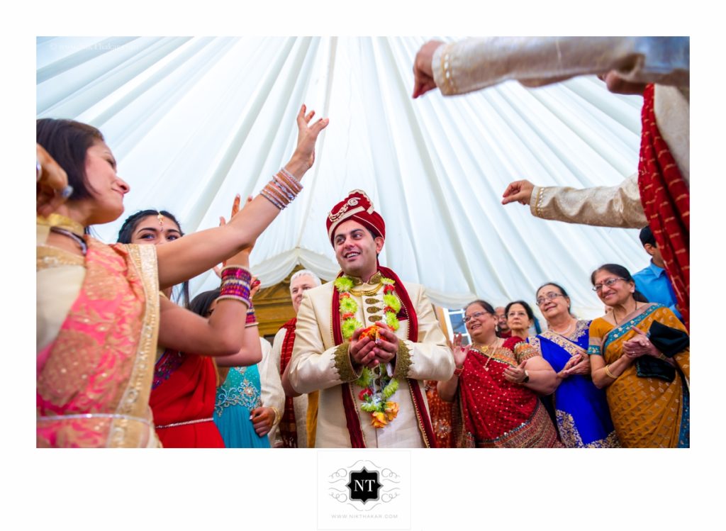 Indian wedding photographer grooms arriving