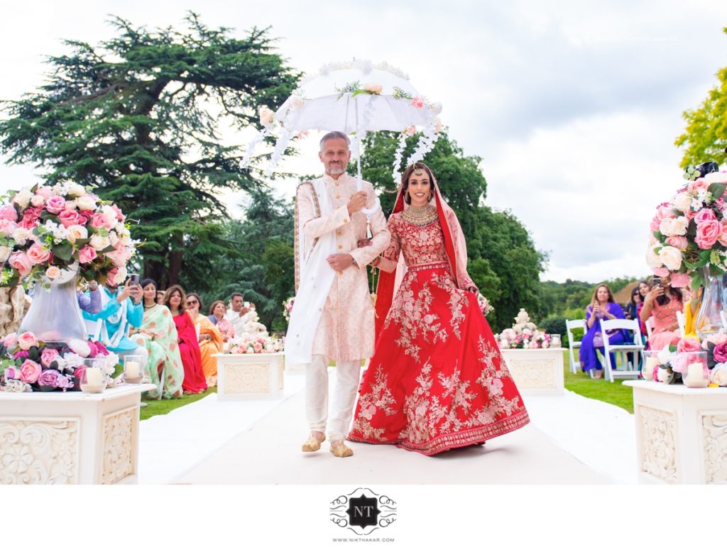 bride at braxted aprk wedding - Braxted park indian wedding - gujarati wedding at braxted park. Nik Thakar Asian wedding photographer 